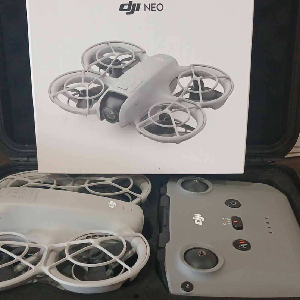 DJI NEO Foldable Drone and Matching Gray Controller